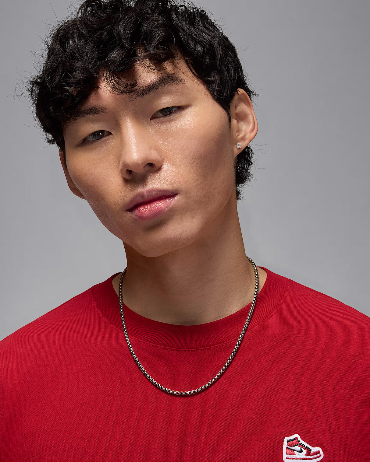 Jordan Brand Playera con parche de tenis para hombre