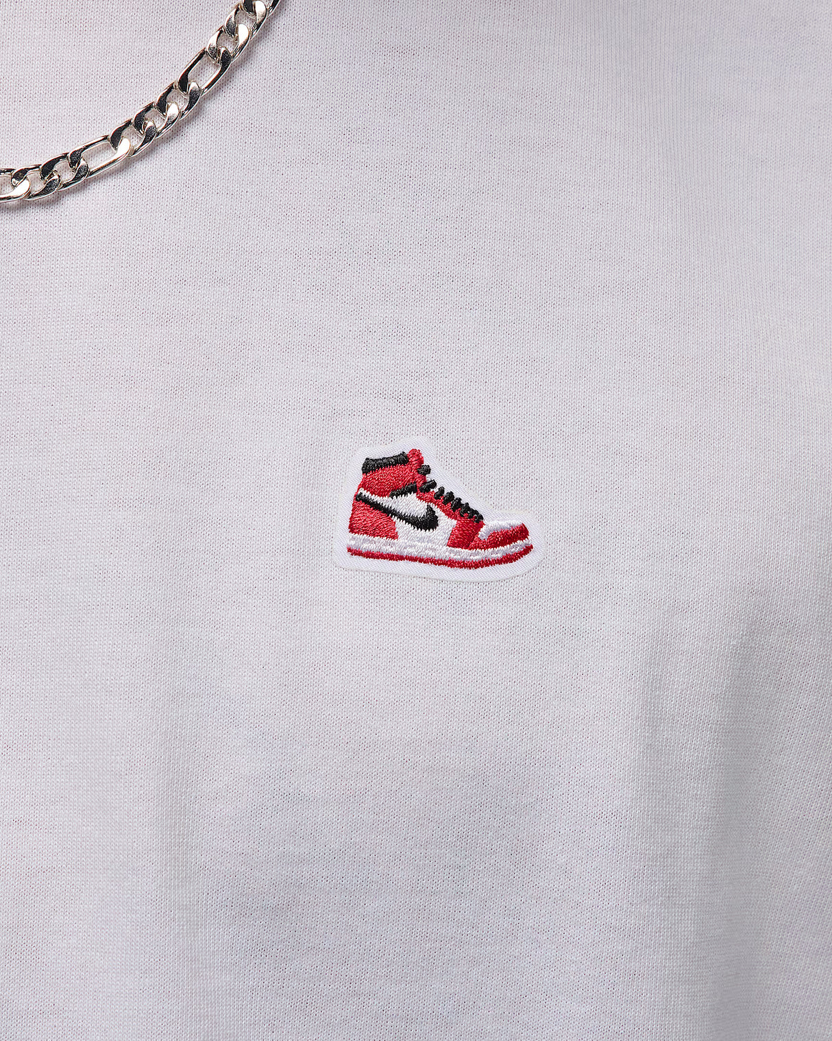 Jordan Brand Playera con parche de tenis para hombre