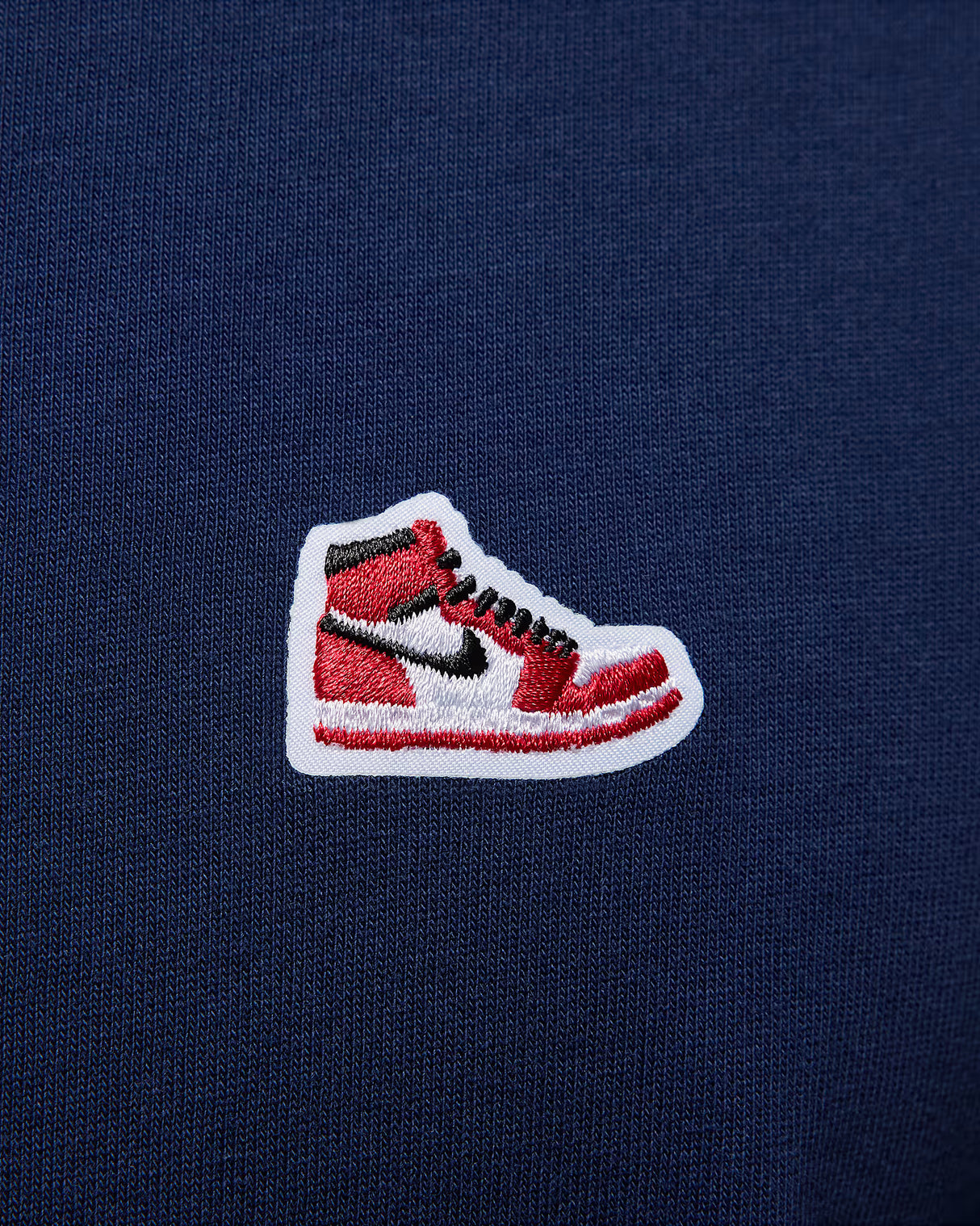 Jordan Brand Playera con parche de tenis para hombre