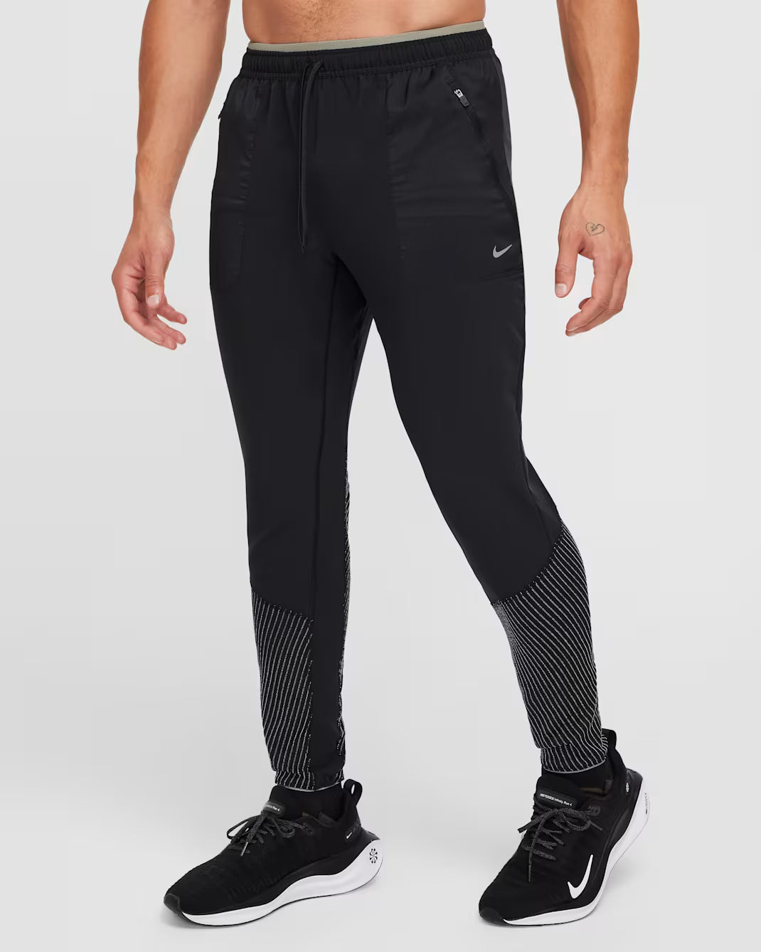 Materiales reciclados  Nike Phenom Running Division Pantalones de running Dri-FIT para hombre