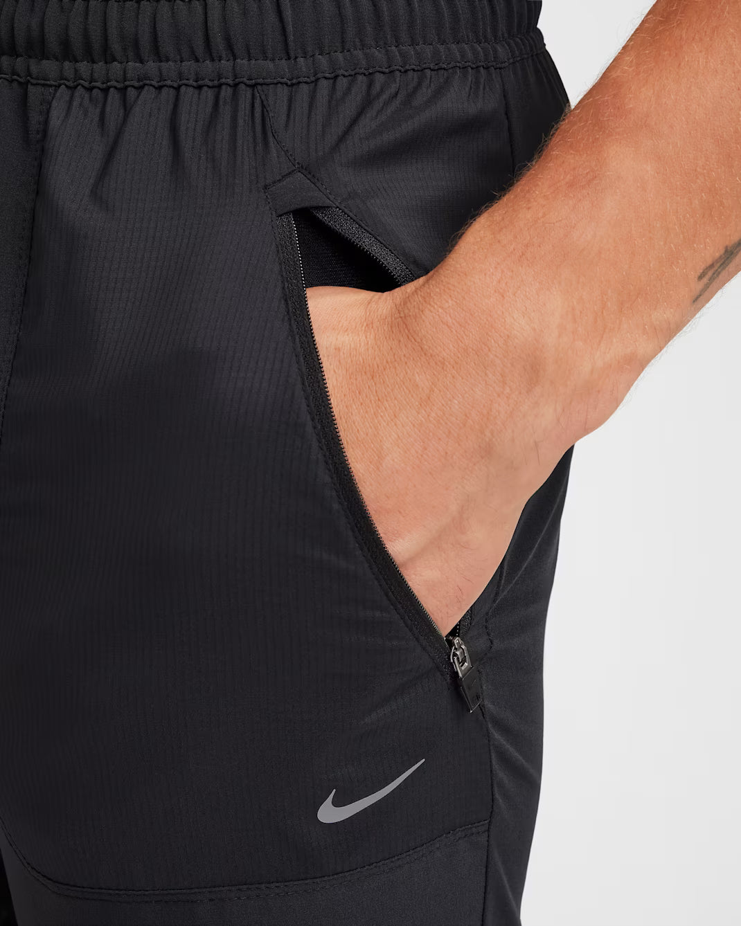 Materiales reciclados  Nike Phenom Running Division Pantalones de running Dri-FIT para hombre